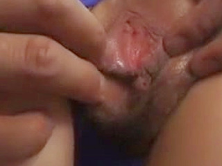 Sexy Japanese babe shows off her pussy while sporting a pigtail.